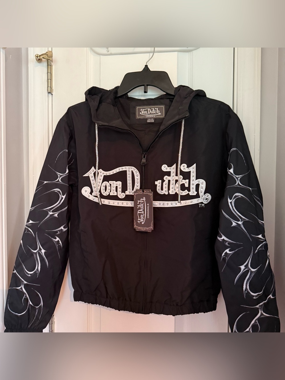 Von Dutch women’s Black Hooded Windbreaker with White Graphic Sleeves